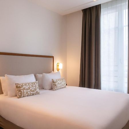 Le Lampika Hotel Paris Rum bild